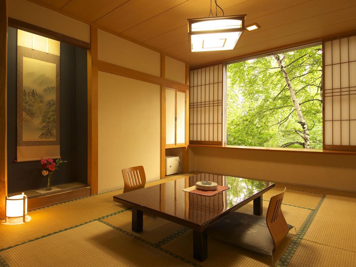 Kusatsu Skyland Hotel Bagian luar foto