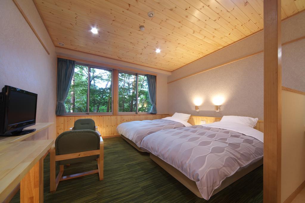 Kusatsu Skyland Hotel Bagian luar foto