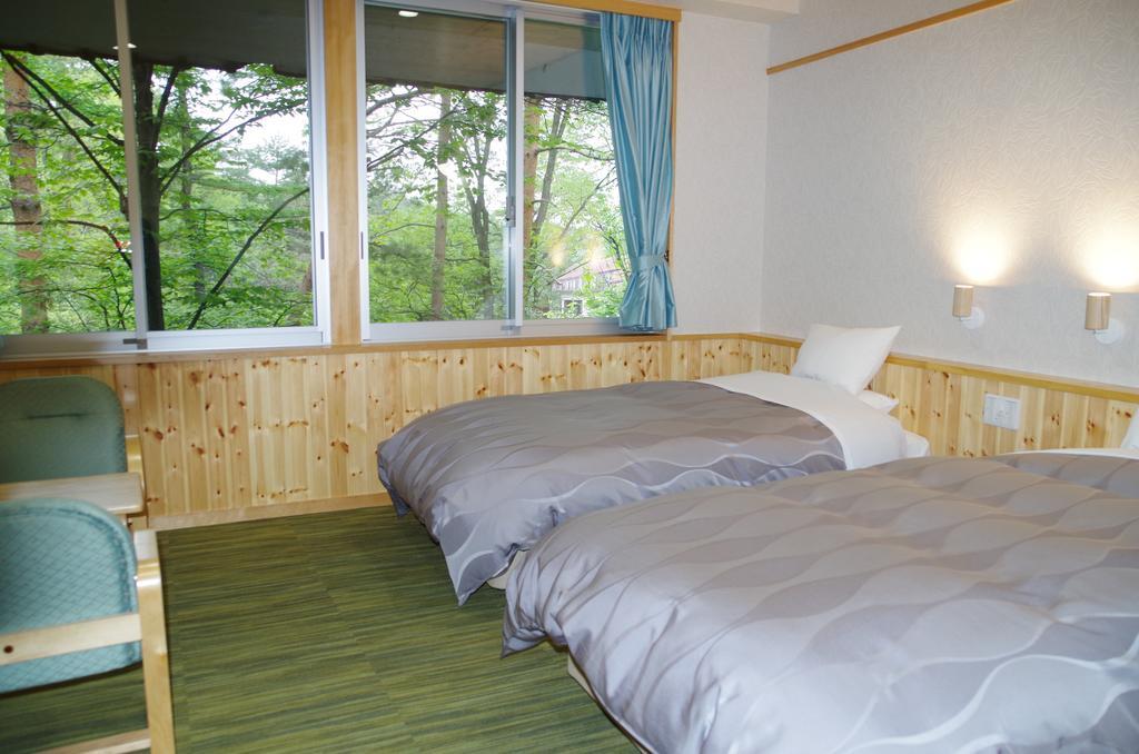 Kusatsu Skyland Hotel Bagian luar foto