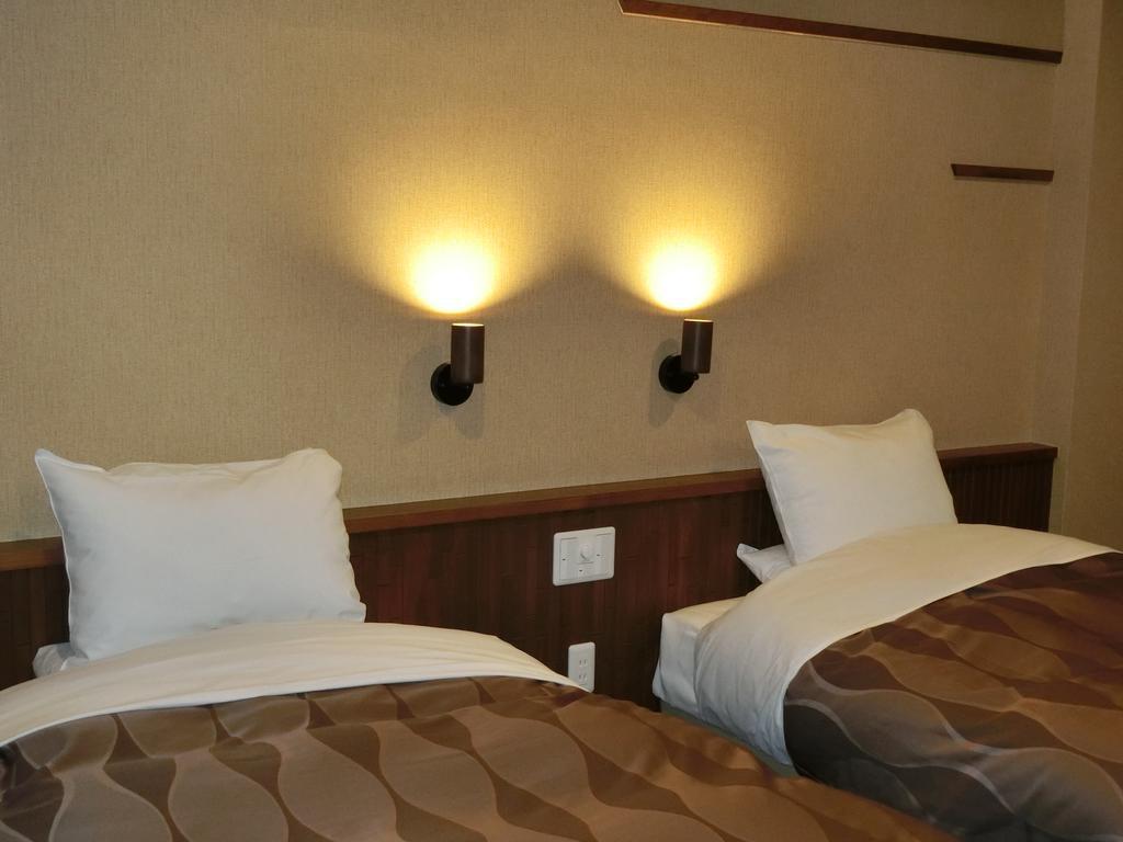 Kusatsu Skyland Hotel Bagian luar foto