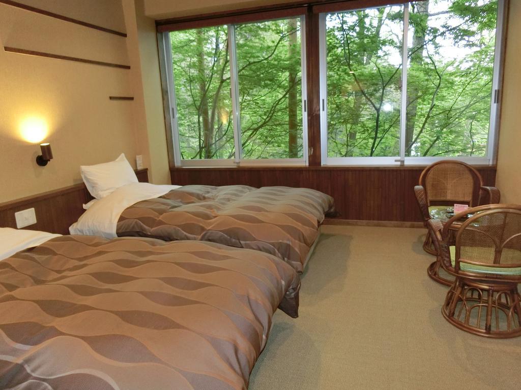 Kusatsu Skyland Hotel Bagian luar foto