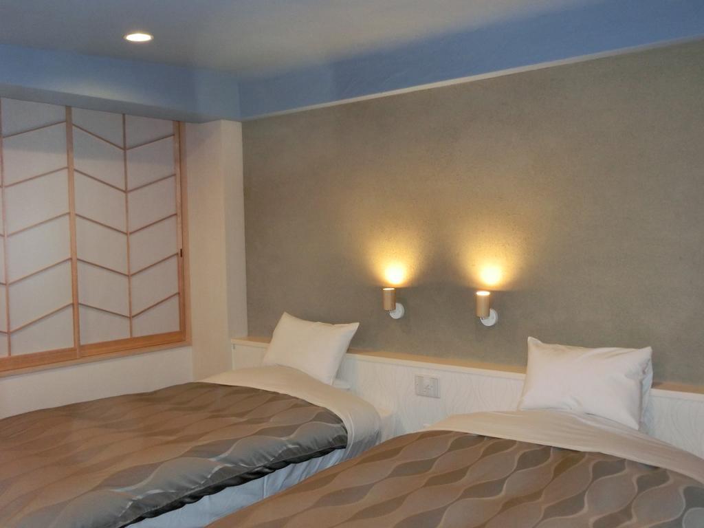 Kusatsu Skyland Hotel Bagian luar foto